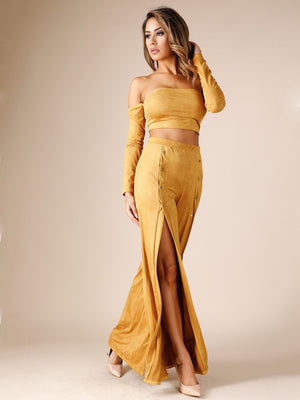 Lexa, pants with thigh high slits and gold button - Dimesi Boutique